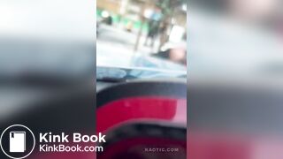 Woman shits on the street.