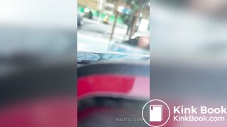 Woman shits on the street.