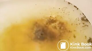 Girl shitting over bathtub