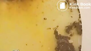 Girl shitting over bathtub