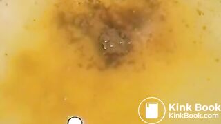 Girl shitting over bathtub