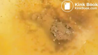 Girl shitting over bathtub