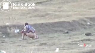 Desi bhabi pooping on open field