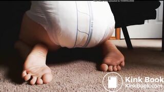 Releasing enema into diaper and showing the result