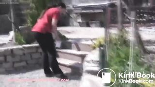 Woman pooping on her patio steps..