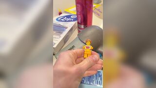 Lego man flushed