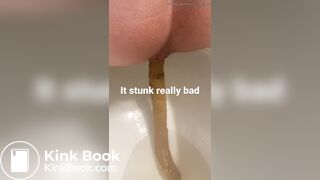 young long turd toilet