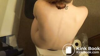 Hot Redhead girl pooping on toilet other view