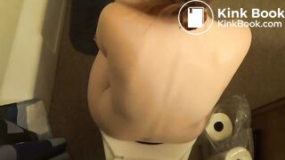 Hot Redhead girl pooping on toilet other view