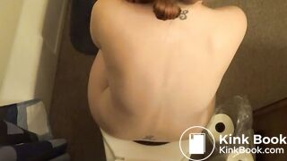 Hot Redhead girl pooping on toilet other view