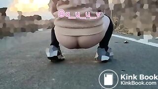 Japanese Twitter girl outside big long poop