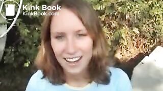 White girl poops outside near a farm