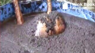 Thai girl taking a bath in cow shit.