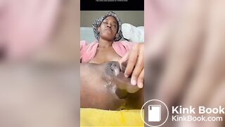 Ebony puts dildo in her ass