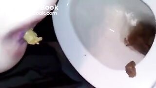 Girl takes a shit in the toilet
