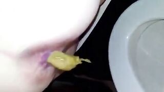 Girl takes a shit in the toilet