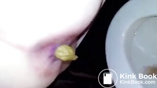 Girl takes a shit in the toilet
