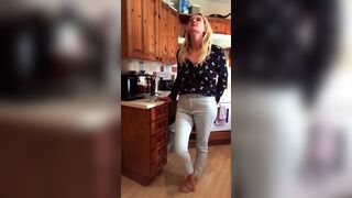 Blonde topless jeans poo