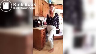 Blonde topless jeans poo