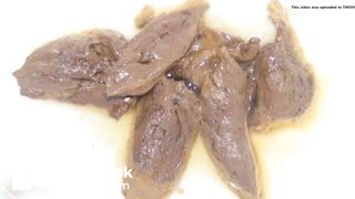 self filmed short haired woman strains to poop