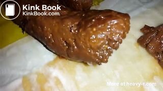 Sucking and licking her own big turd
