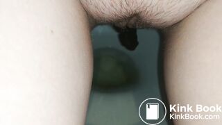Showing hairy pussy while shitting