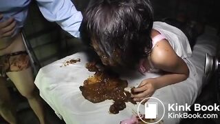 Jap girl covered in scat and eating most of it.