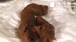 Sweet asian takes a shit on a diaper