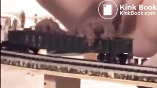 Shitting on a model train