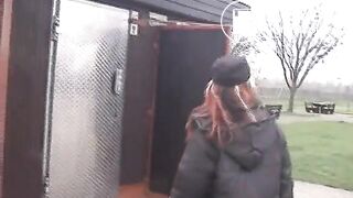 Sexy dropped a big turd on the ground, in a parking lot