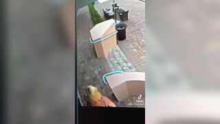 Blonde Woman poops on sidewalk