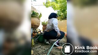 Big ass ebony girl pooping in garden