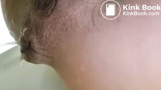 Girls pisses out her ass