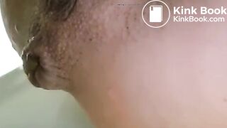 Girls pisses out her ass