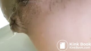 Girls pisses out her ass