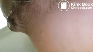 Girls pisses out her ass
