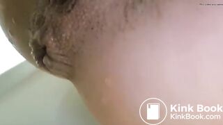Girls pisses out her ass