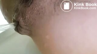 Girls pisses out her ass