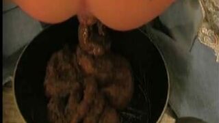 Giant pile of poop in a pan