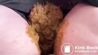 Sexy shitting in black pants