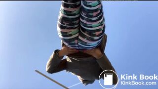 Young woman pooping outdoors