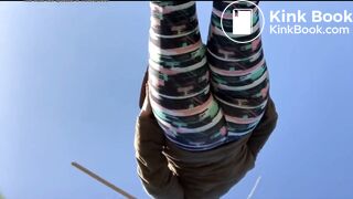 Young woman pooping outdoors
