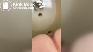 Girl shitting constipated turd - video 2