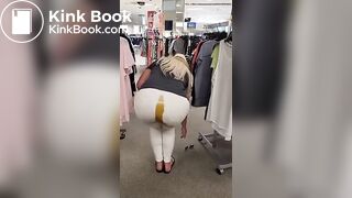 Blonde girl shits in white jeans