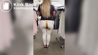 Blonde girl shits in white jeans