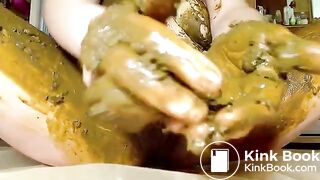 Beautiful babe rubbing shit on her half naked body