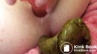 Closeup dildo fuck with pee and poo