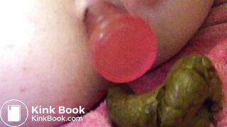 Closeup dildo fuck with pee and poo