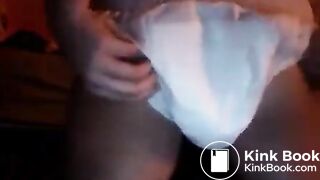 girl shitting in diaper and touches her shit