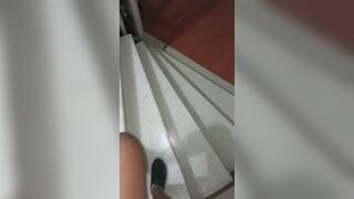 Girl pooping on corridor floor